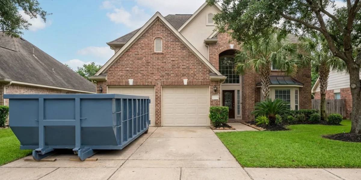Roll-off dumpster delivery in Clear Lake, TX — suburban driveway